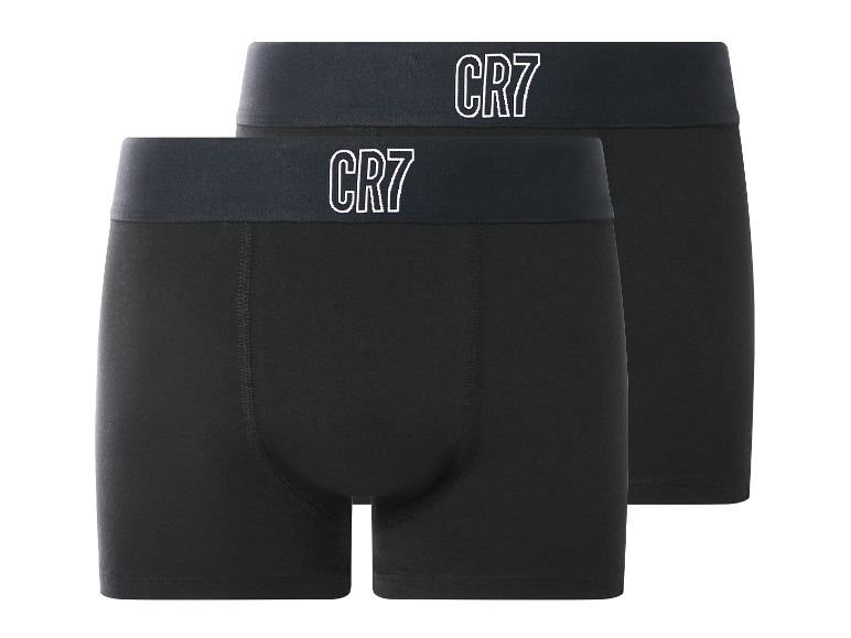 Zwei schwarze Boxershorts mit dunklen Gummibändern und weißen „CR7“-Logos.