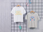 Zwei T-Shirts mit sommerlichen Prints: 'Fresh Summer' und 'Stay Cool'.
