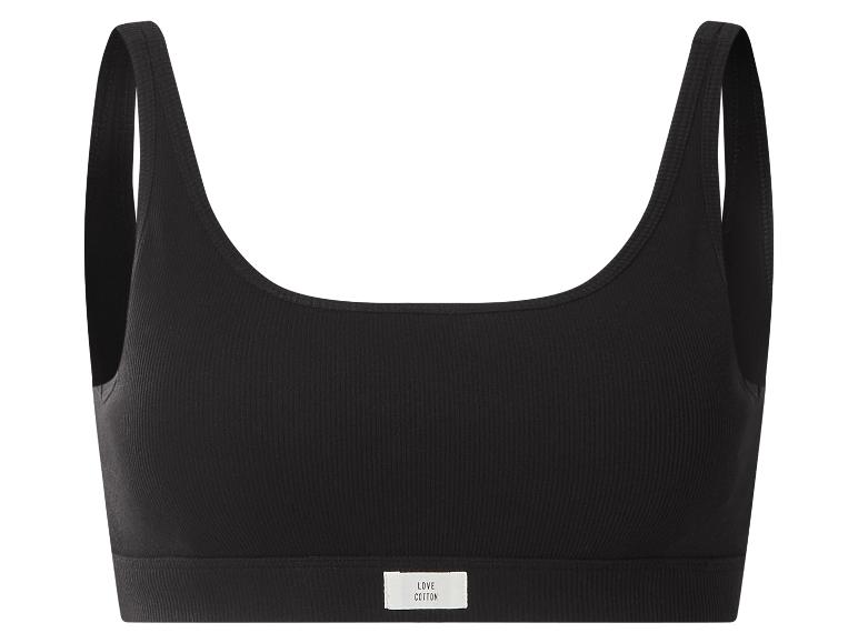 Schwarzes geripptes Baumwoll-Sporttop mit breiten Trägern und einem weißen Etikett.