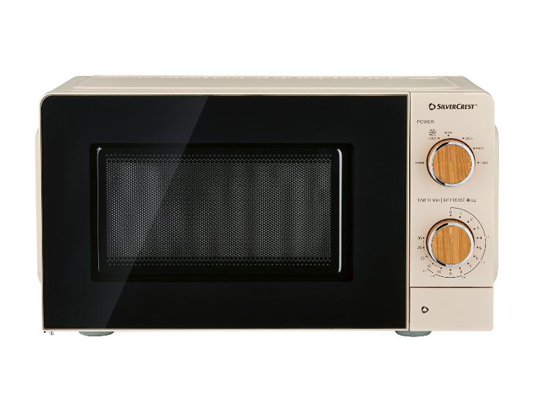 Beige Mikrowelle mit schwarzem Bedienfeld und zwei Holzreglern für Leistung und Zeit.