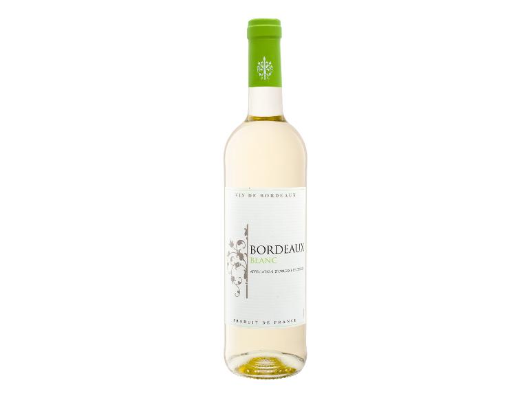 Flasche Weißwein mit grünem Verschluss und Etikett mit der Aufschrift „Bordeaux Blanc“.