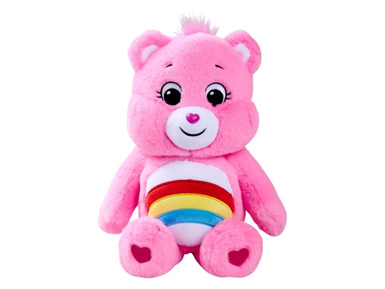 Ein pinker Care Bear Plüschbär mit Regenbogen auf dem Bauch.