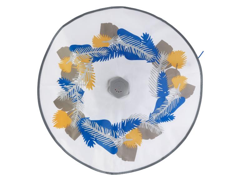 Ein rundes Katzenkratzspielzeug mit blauen und gelben Blättern.