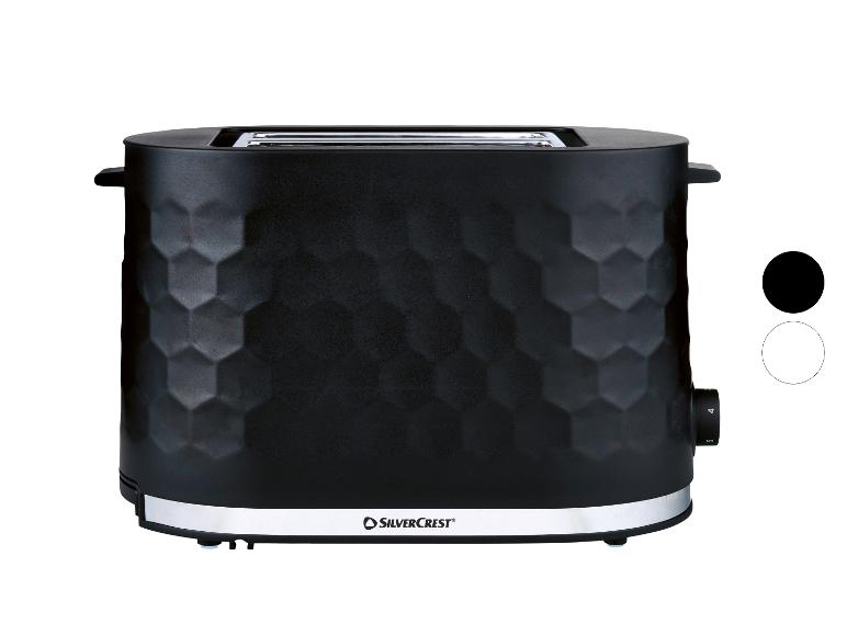 Schwarzer Toaster mit Wabenmuster und silbernem Sockel.