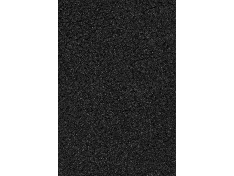 Nahaufnahme einer schwarzen, strukturierten Oberfläche.