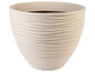 Ein beiger Blumentopf mit geriffelter Textur.