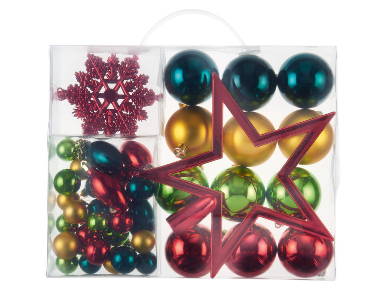Weihnachtsbaumschmuck in einer Box: Kugeln, Stern und Schneeflocke.