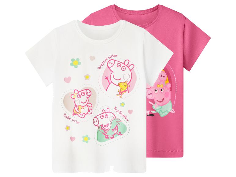 Kurzarm-T-Shirts für Mädchen, ein weißes mit Schweinchen-Prints und ein rosa mit einem Schweinchen.