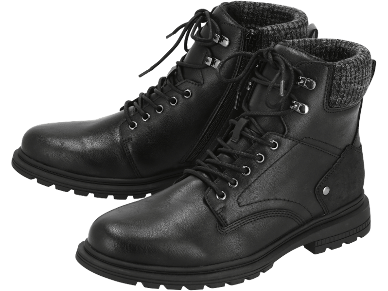Ein Paar schwarze Herren-Schnürstiefel mit Strickbund.