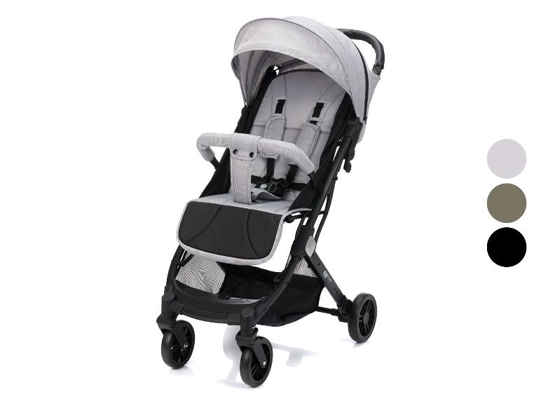 Grauer Kinderwagen mit schwarzem Gestell und Rädern, mit Farbmustern in Grau, Braun und Schwarz.