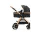Schwarz-goldener Kinderwagen mit Babywanne und verstellbarem Griff