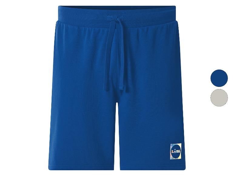 Blaue Sweatshorts mit Kordelzug an der Taille und kleinem Logo am Bein.