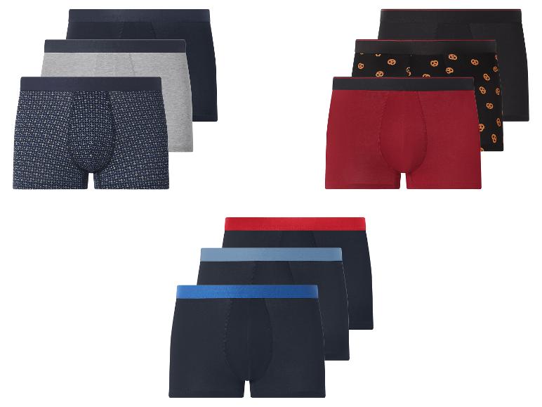 Set Herren-Boxershorts in verschiedenen Farben und Mustern, darunter einfarbig und mit Brezel-Print.