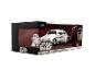 Star Wars R2-D2 Figur und 1959 Volkswagen Drag Beetle Spielzeugauto in einer Displaybox.