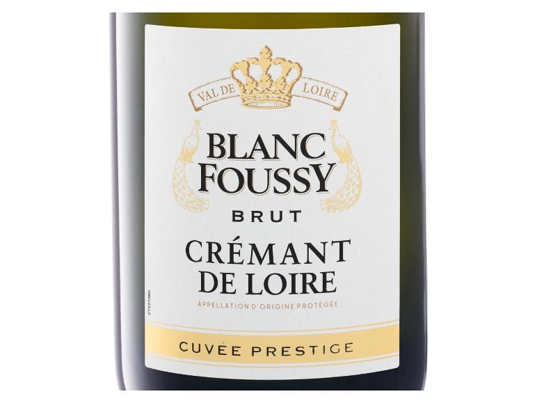 Flasche Weißsekt mit dem Etikett „Crémant de Loire Cuvée Prestige“.