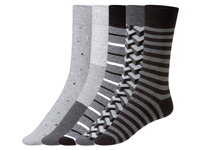 Vier Paar Socken in Grau und Schwarz mit verschiedenen Mustern.