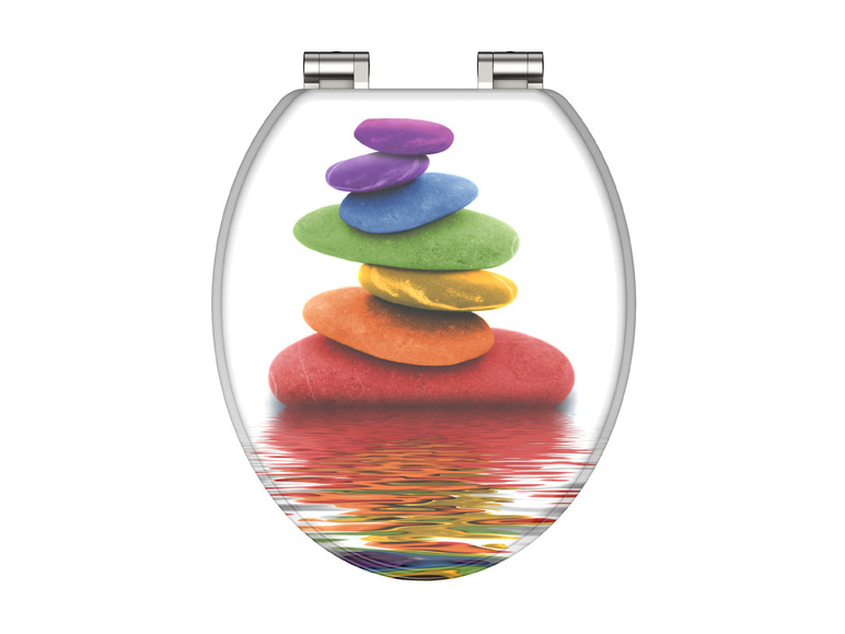 Ein weißer Toilettensitz mit einem Bild von bunten Steinen auf Wasser.