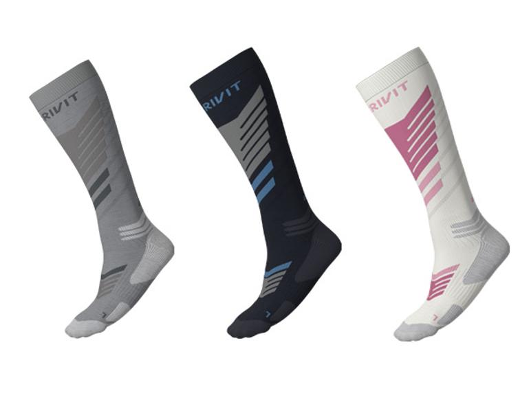 CRIVIT Unisex Premium-Ski-Funktionsstrümpfe in Grau, Schwarz und Weiß mit farbigen Akzenten.