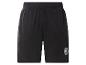Schwarze Sporthose mit elastischem Bund und rundem Emblem am linken Bein.