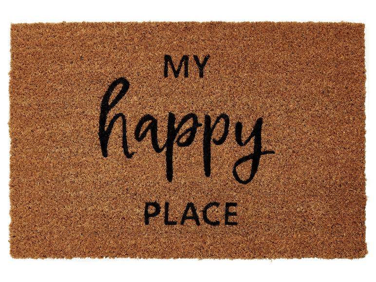 Eine Fußmatte mit dem Text 'My Happy Place'.