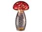 Rote Pilzlampe mit gesprenkeltem silbernem Sockel.