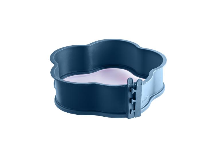 Dunkelblaue Silikon-Backform mit herzförmigem Boden und Schnallenverschluss.