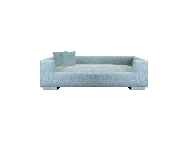 Hellblaues Hundebett mit Kissen.