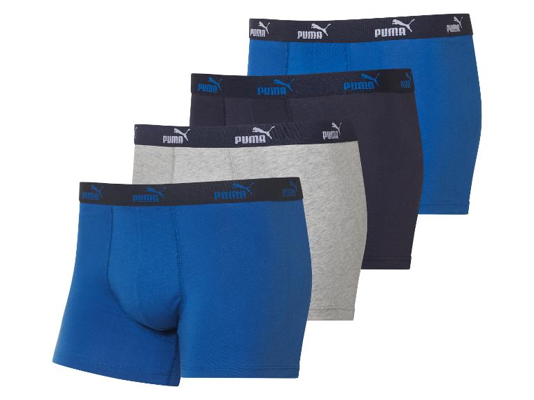 Drei Puma Boxershorts: blau, grau und dunkelblau.