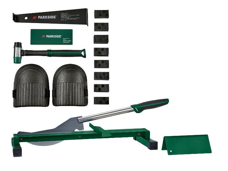 Laminat-Verlegeset mit Schneider, Knieschonern, Hammer und Abstandshaltern.