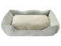 Ein graues Hundebett von Zoo'n Fair mit einem weichen Kissen.