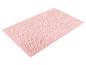 Hellrosa Badezimmermatte, weiche Textur.