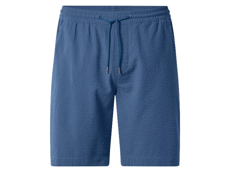 Blaue Herren-Shorts mit Struktur, elastischem Bund und Kordelzug.