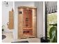 HOME DELUXE Infrarotsauna in einem modernen Badezimmer mit Holzschränken und Pflanzen.