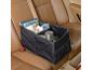 Schwarzer Auto-Organizer mit Büchern, Spielzeug und einer Thermoskanne auf einem beigen Autositz.
