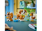 Drei Spielzeugtiere aus Bausteinen: ein Eichhörnchen, ein Hund und eine Ente.