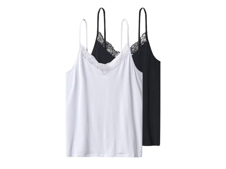 Zwei Camisole-Tops, ein weißes und ein schwarzes, beide mit Spitze.