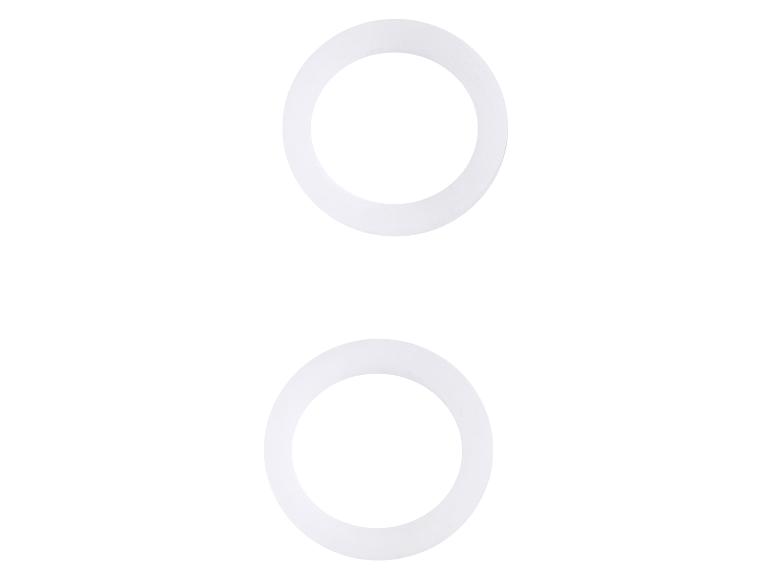 Zwei weiße O-Ringe auf weißem Hintergrund.