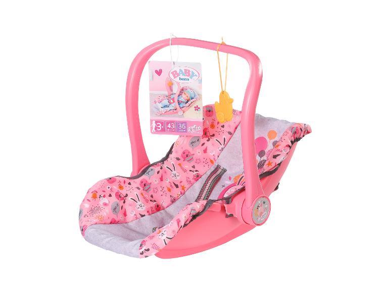 BABY born rosa Puppenautositz mit gemustertem Stoff und Hängespielzeug.