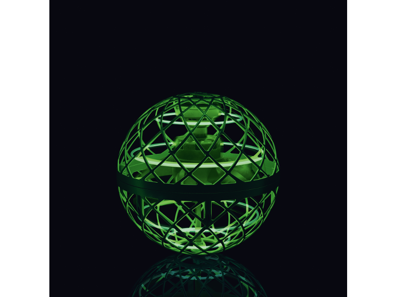 Leuchtender grüner fliegender Spinner-Ball auf schwarzem Hintergrund