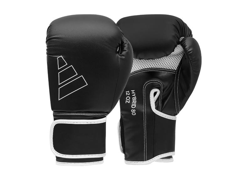 Ein Paar schwarze Boxhandschuhe mit weißen Details und der Aufschrift „HYBRID 80 12 OZ“.