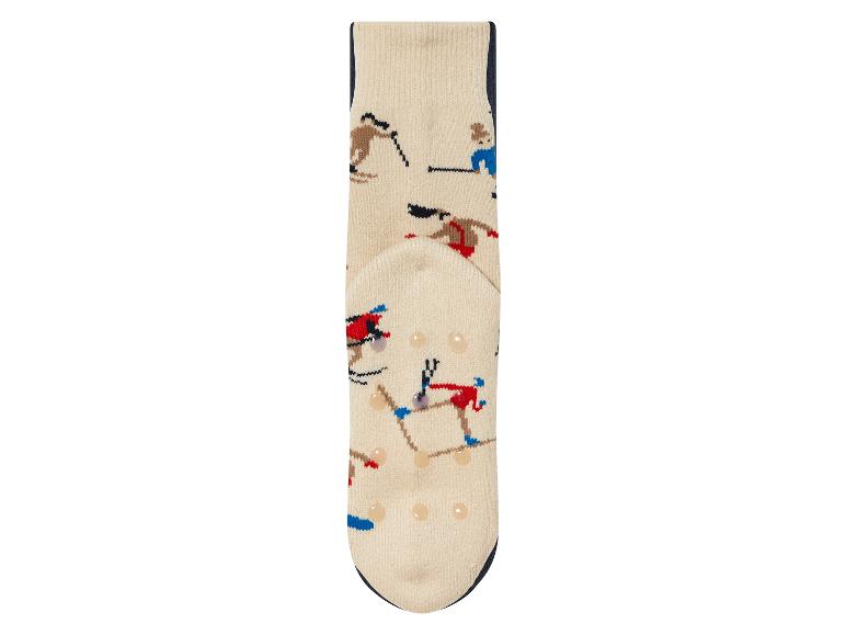 Socken mit Wintersport-Motiv und Anti-Rutsch-Punkten.