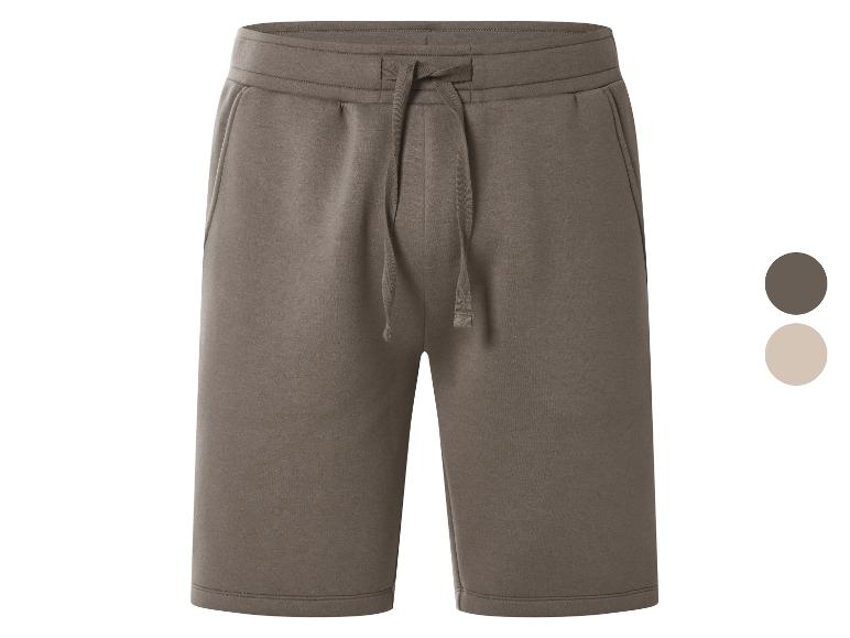 Braune Sweatshorts mit verstellbarem Kordelzug, abgebildet mit braunen und beigen Farbmustern.