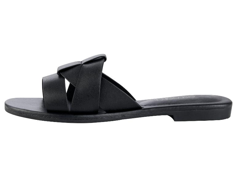 Schwarze Sandalen mit gekreuzten Riemen, minimalistischer Stil.
