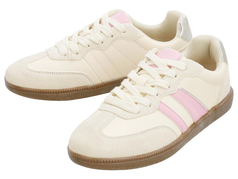 Ein Paar cremefarbene Sneaker mit rosa Streifen und brauner Gummisohle