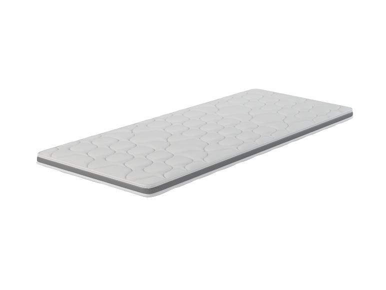 Weiße Matratze mit grauem Rand und Wellenmuster