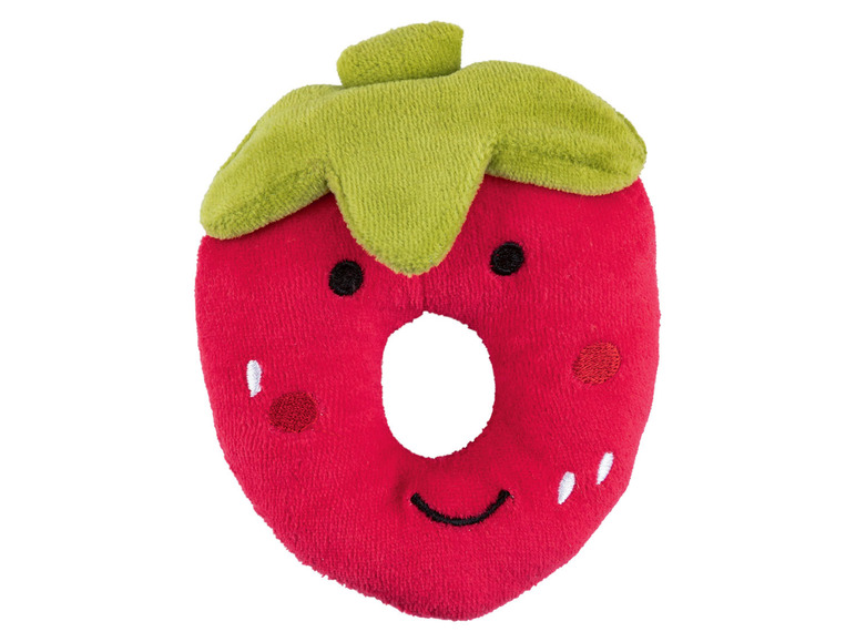 Ein rotes Plüschspielzeug in Form einer Erdbeere mit grünem Stiel.