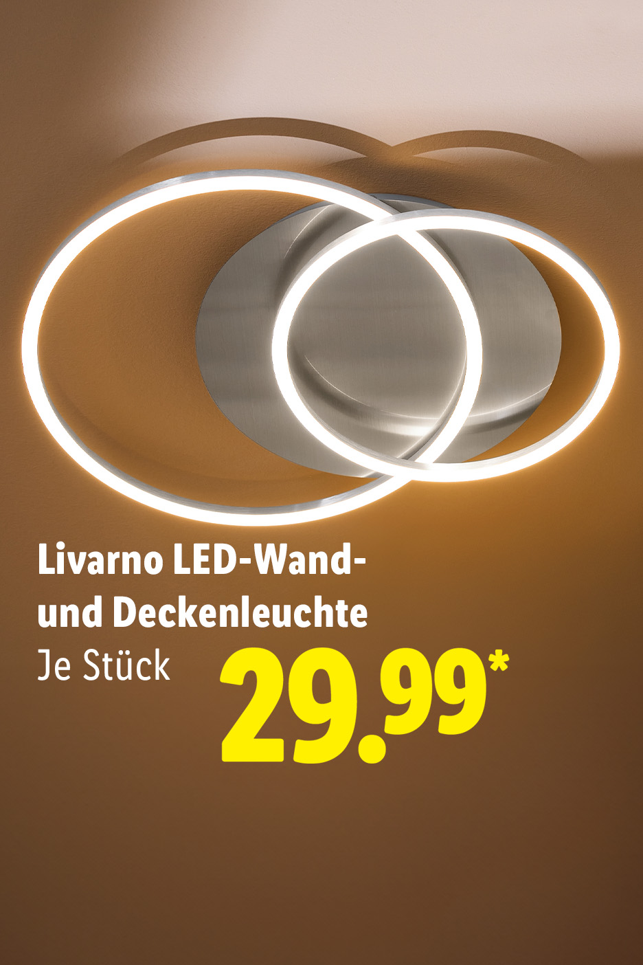 Moderne LED-Deckenleuchte mit zwei ineinandergreifenden Ringen und warmweißem Licht.