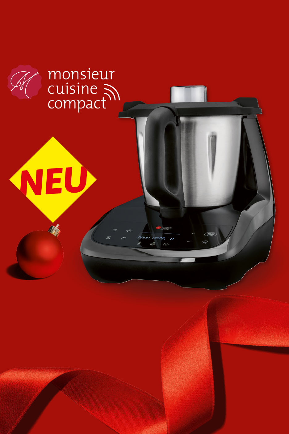 Monsieur Cuisine Compact Küchenmaschine, neu, mit Weihnachtsdeko auf rotem Hintergrund.