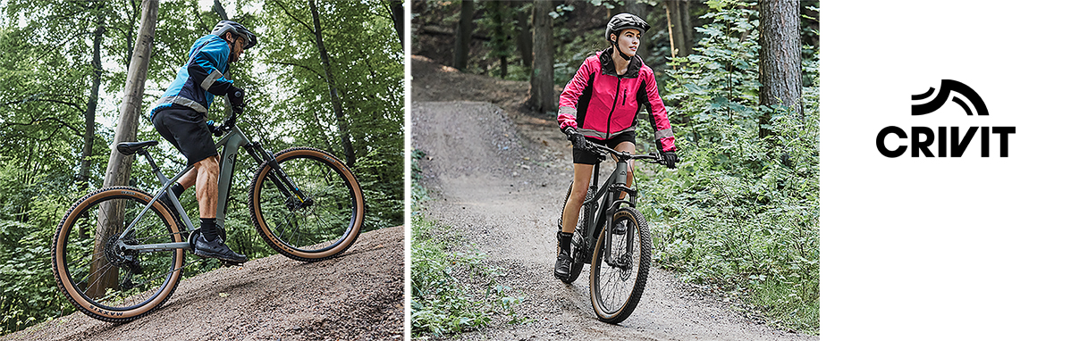 Crivit Mountainbikes: Modelle für Männer und Frauen auf einem Waldweg.